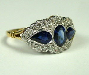 Appraisal: An ct gold sapphire and diamond dress ring With central