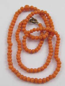 Appraisal: A graduated coral bead necklace the beads graduating from mm