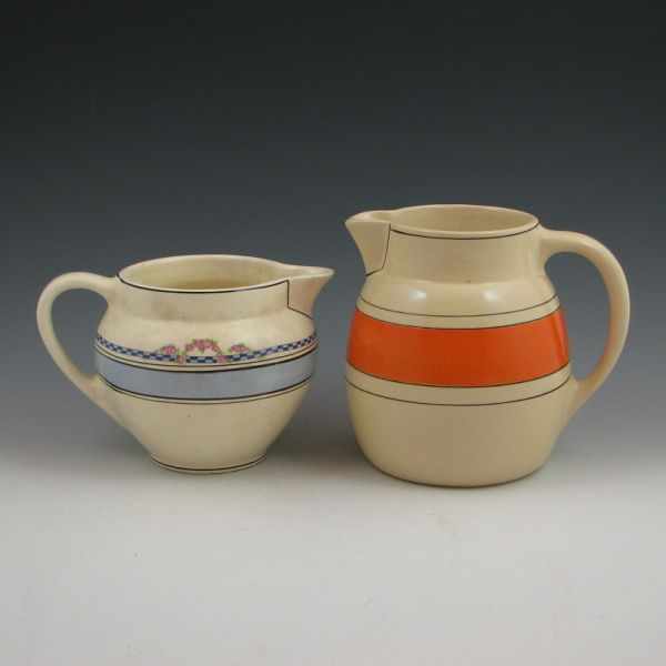 Appraisal: Two Roseville pitchers including a Creamware pitcher with flowers and