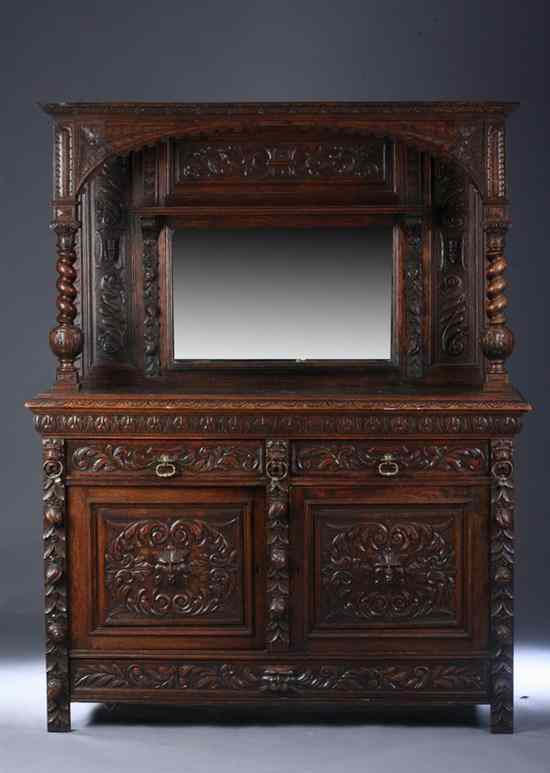 Appraisal: RENAISSANCE REVIVAL CARVED OAK SIDEBOARD th century Arched opening above