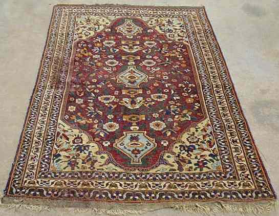 Appraisal: Colorful tribal Kashan oriental throw mat red field floral patterns