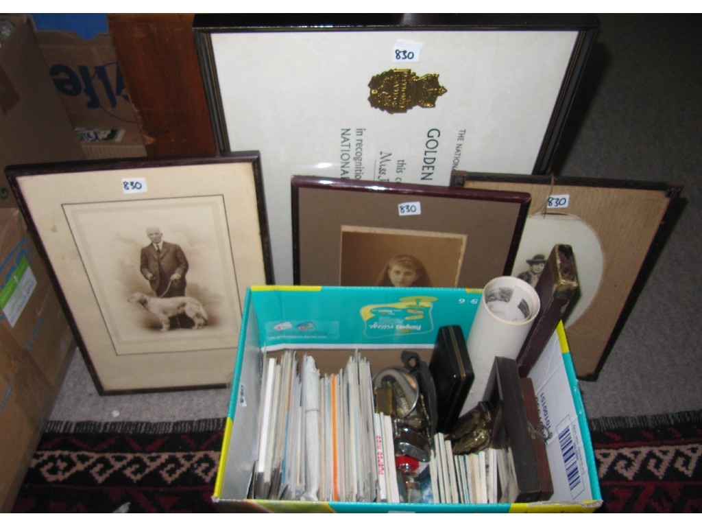 Appraisal: Box of miscellania and postcards two framed photos and a