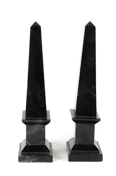 Appraisal: A group of four black marble obelisks height in width