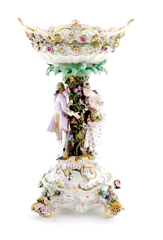 Appraisal: Meissen centerpiece on stand circa floral-encrusted and reticulated Rococo basket