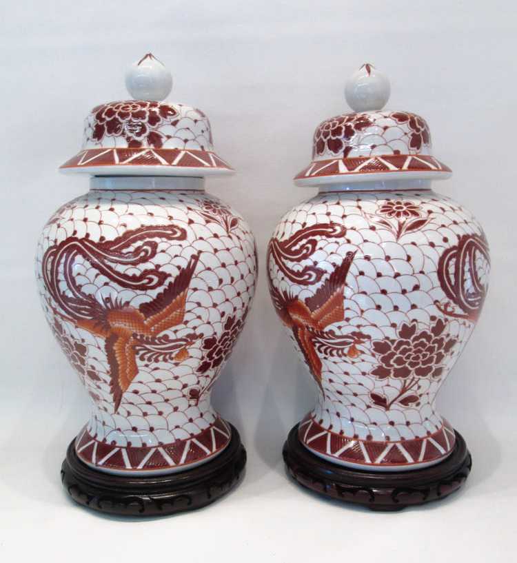 Appraisal: TWO CHINESE PORCELAIN LIDDED JARS with flying phoenix motif each