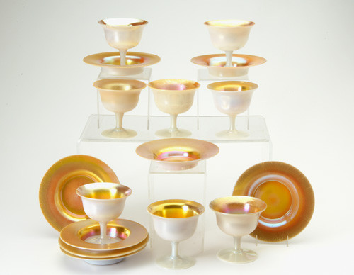 Appraisal: STEUBEN Set of eight Aurene footed sherbert cups and plates