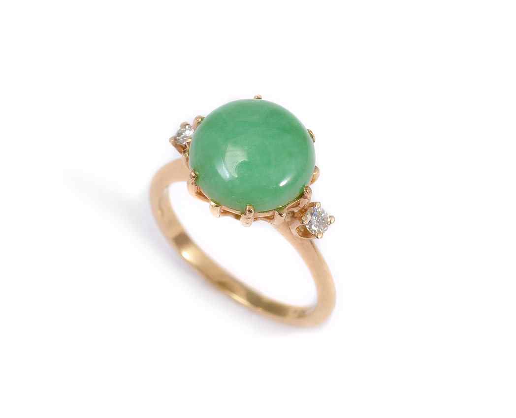 Appraisal: GREEN JADEITE JADE DIAMOND RING k yellow ring centering one