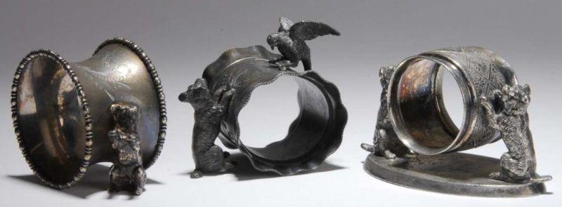 Appraisal: Lot of Dog Figural Napkin Rings Description First has two