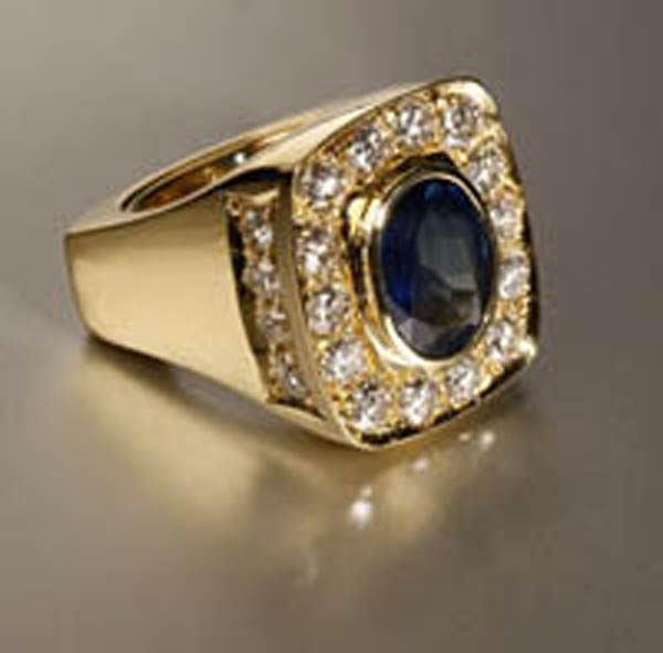 Appraisal: A sapphire and diamond ring Capuano A sapphire and diamond