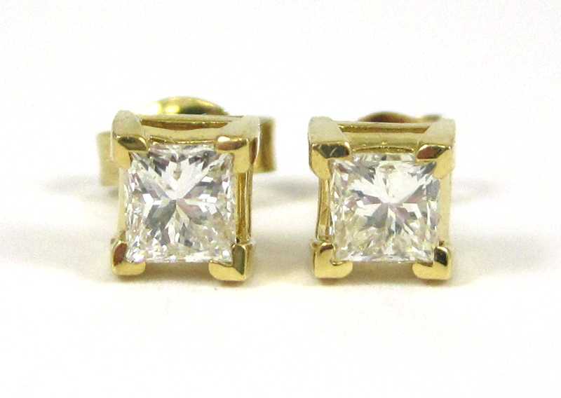 Appraisal: PAIR OF DIAMOND AND EIGHTEEN KARAT GOLD EAR STUDS each