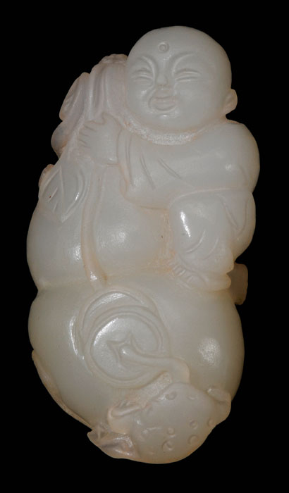 Appraisal: Jade Toggle Qing Dynasty translucent white jade carved as a