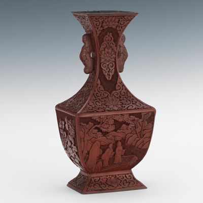 Appraisal: A Carved Cinnabar Vase Aubergine color vase with rectangular shape