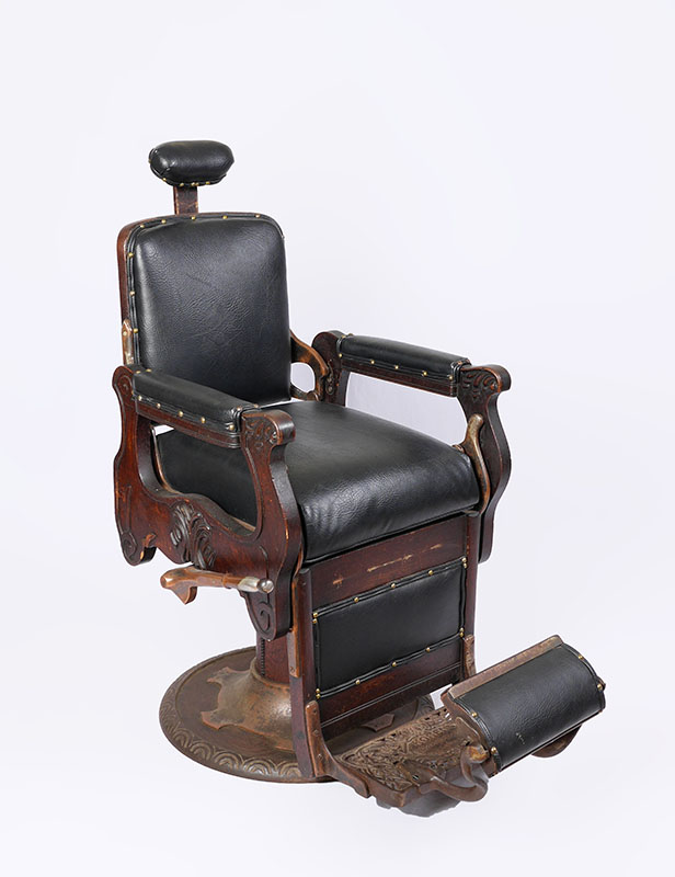 Appraisal: KOKEN CARVED OAK HYDRAULIC BARBER CHAIR Early th century foliate