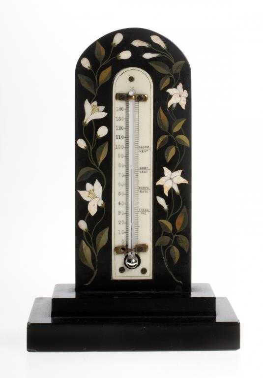 Appraisal: A DERBYSHIRE COLOURED HARDSTONE INLAID BLACK 'MARBLE' THERMOMETER of arched