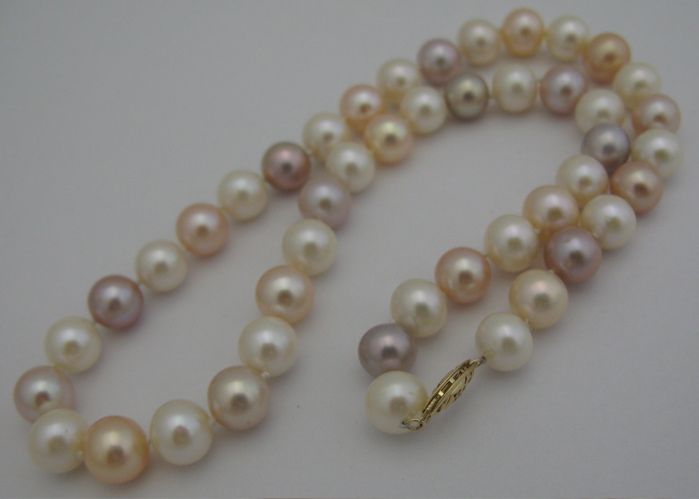 Appraisal: MULTI-COLOR PEARL CHOKER LENGTH NECKLACE Mixed pink white and violet