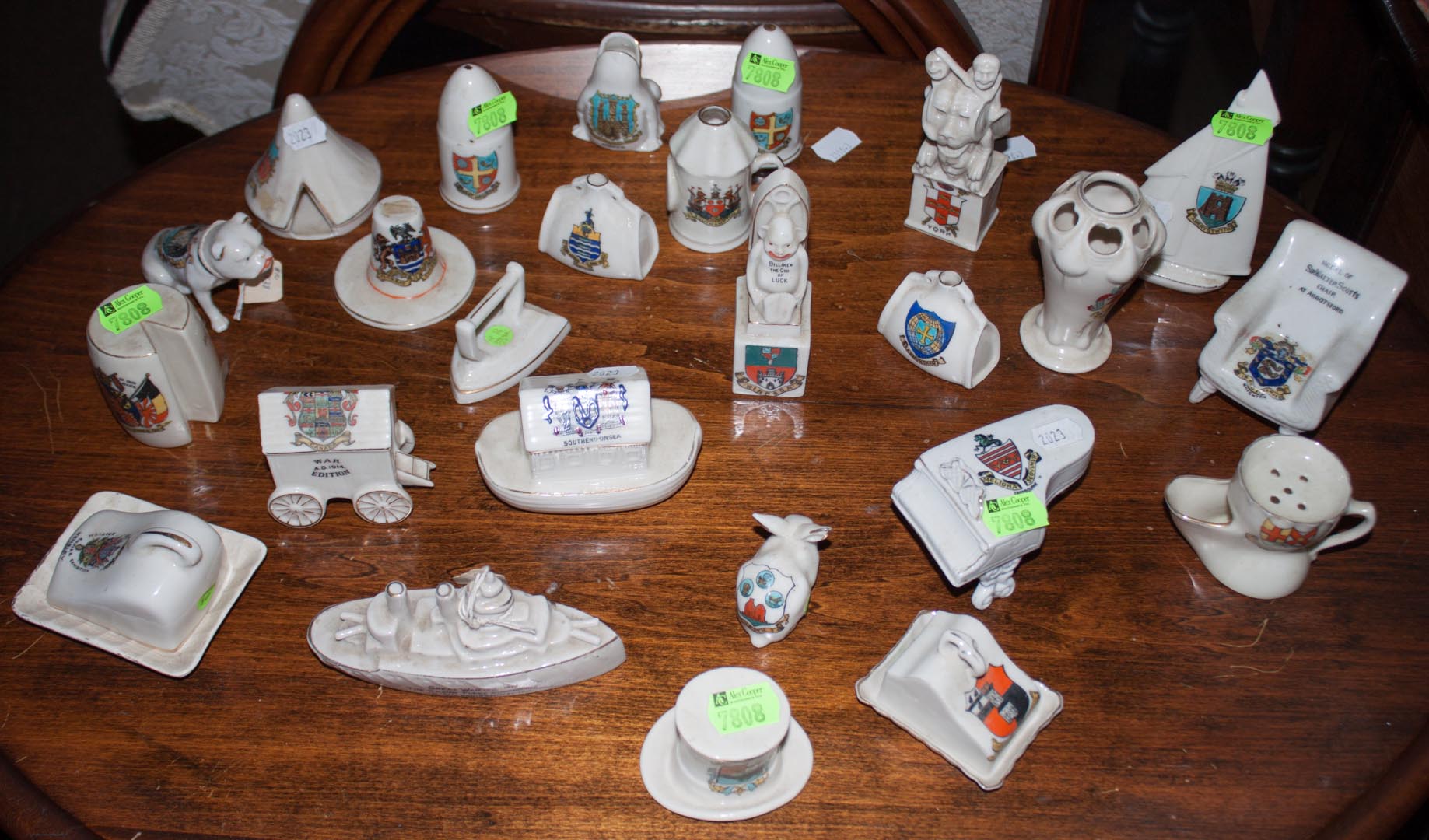 Appraisal: Assortment of figural armorial porcelain souvenirs