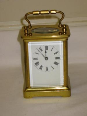 Appraisal: A FRENCH CARRIAGE CLOCK the single barrel movement with platform