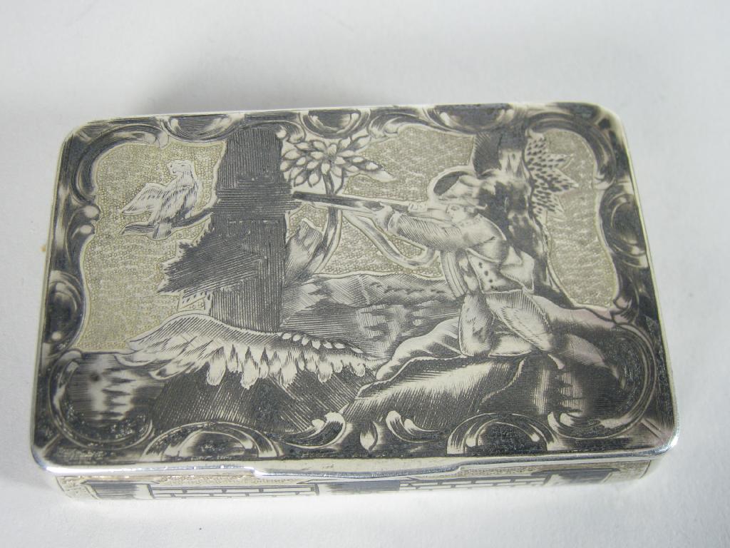 Appraisal: A Russian Niello Snuff Box the lid engraved hunting scene