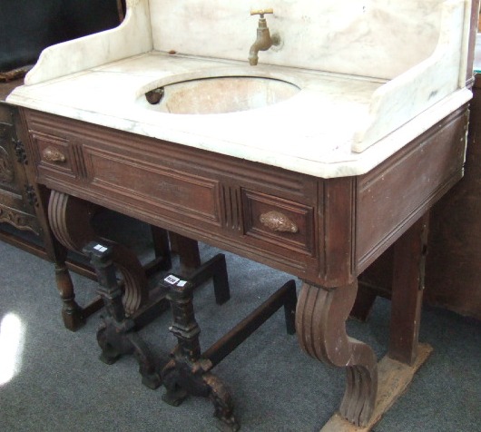 Appraisal: An early th century Continental wash stand the marble top