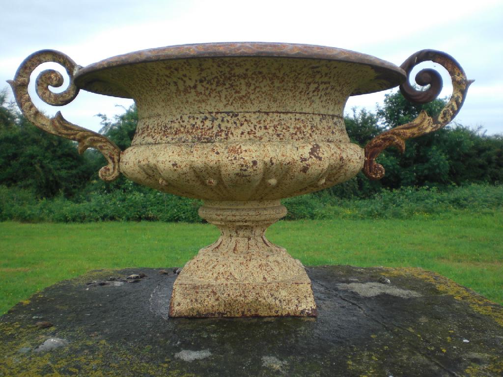 Appraisal: Pair of iron Urns with scroll handles