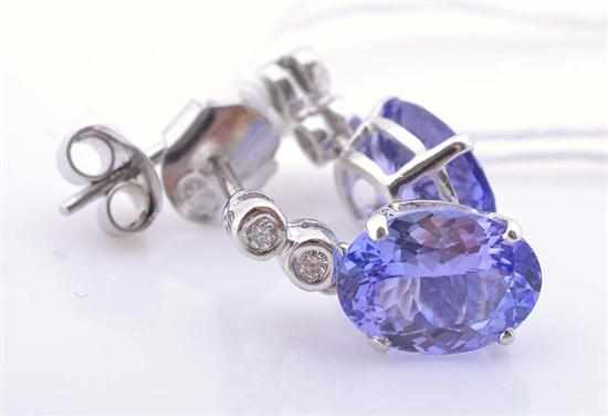 Appraisal: A PAIR OF TANZANITE AND DIAMOND DROP EARRINGS IN CT