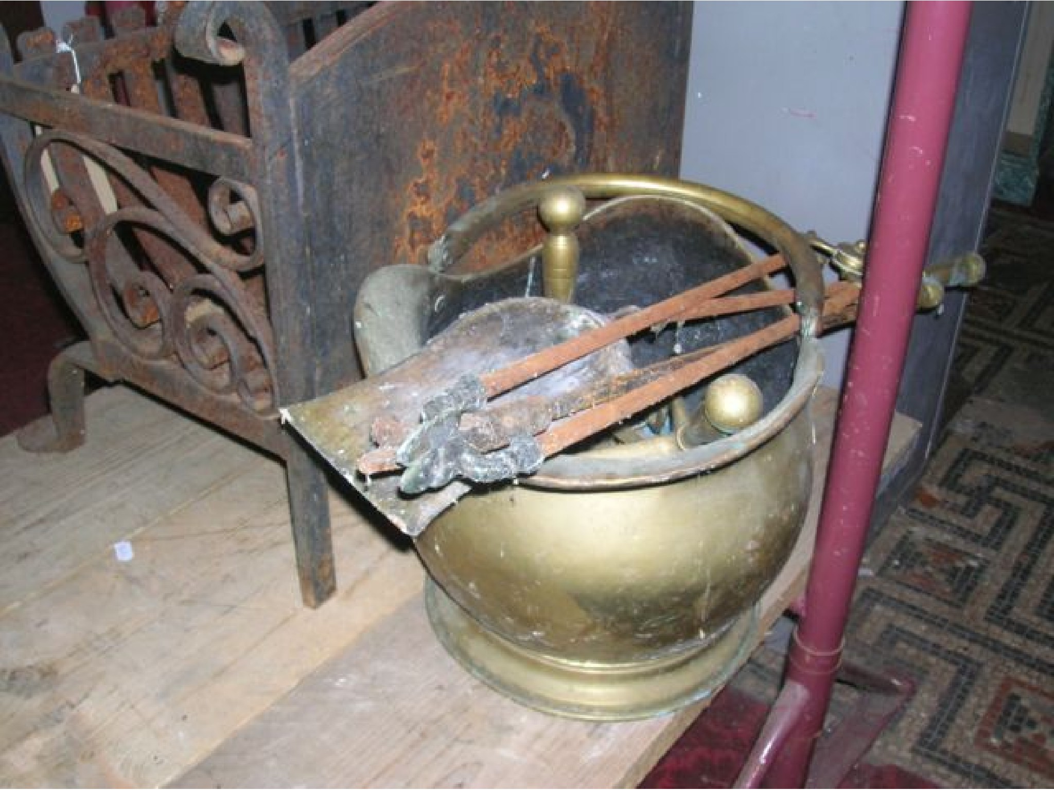 Appraisal: A good quality cast and wrought iron fire basket with