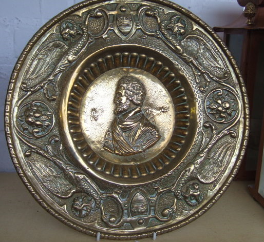 Appraisal: A brass plate th century relief moulded with a portrait