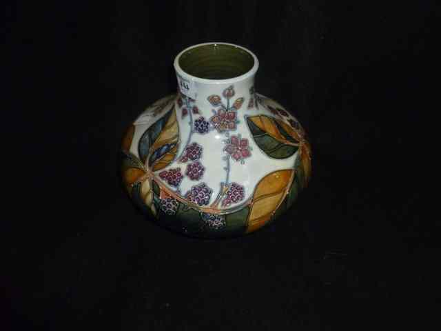 Appraisal: A MODERN MOORCROFT VASE with bramble design by Sally Tuffin