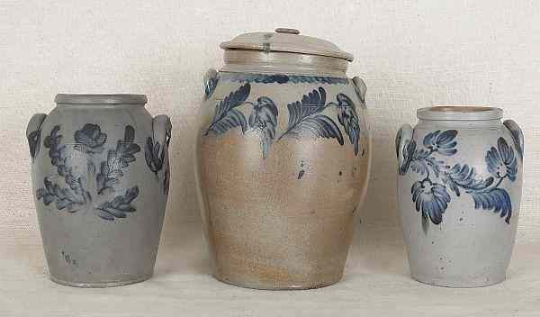 Appraisal: Three Pennsylvania stoneware crocks th c with cobalt floral decoration