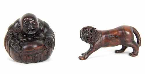 Appraisal: A Japanese carved wood netsuke depicting Pu-Tai and another modelled