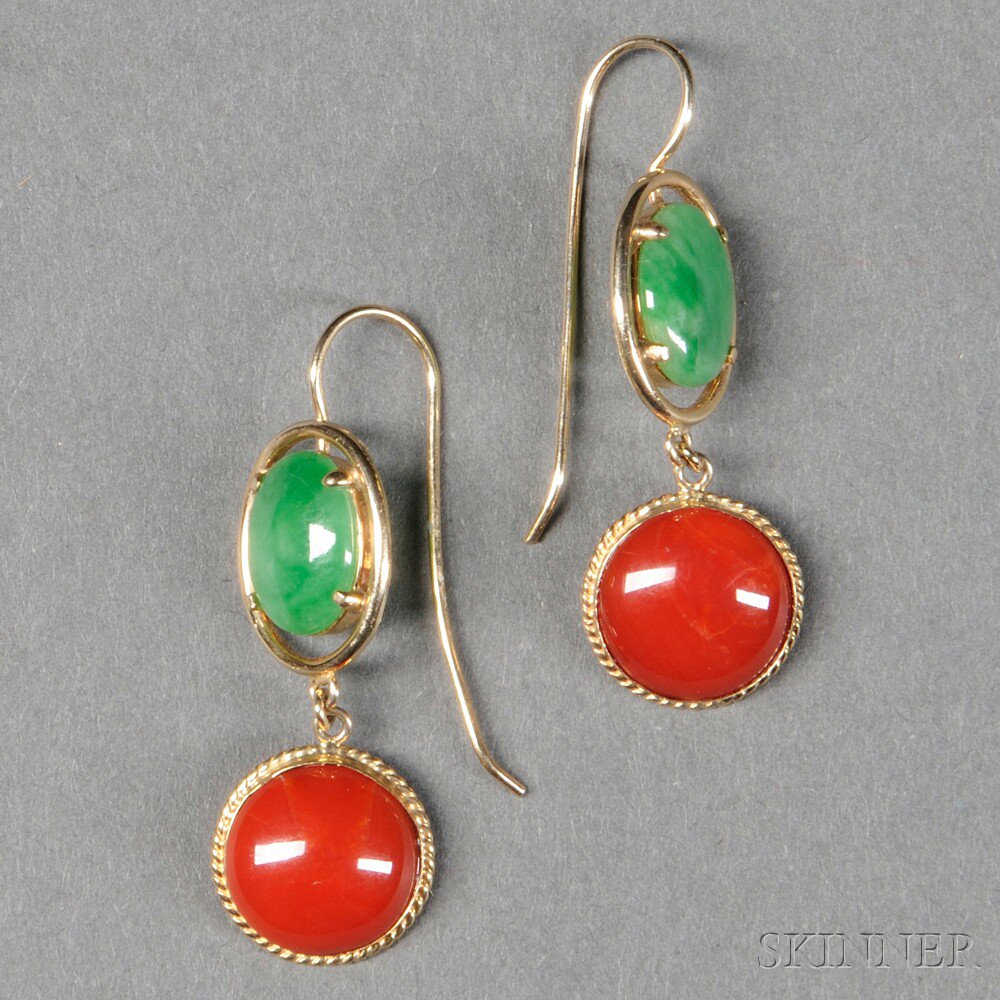 Appraisal: kt Gold Pierced Earrings with an elliptical cabochon jade in