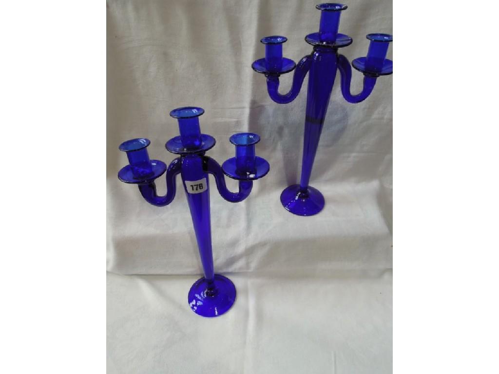 Appraisal: A pair of Bristol Blue glass candelabras cm high approx