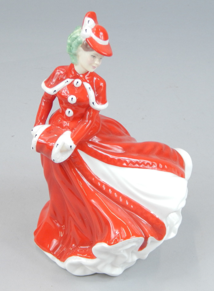 Appraisal: A Royal Doulton porcelain figure Christmas Celebration HN from The