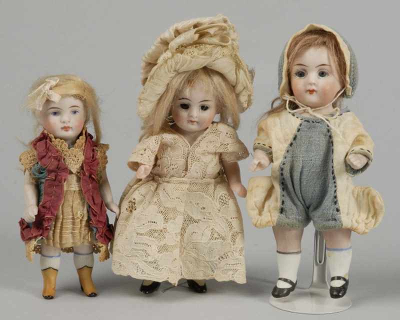 Appraisal: Lot of German All-Bisque Child Dolls Description Kestner girl incised