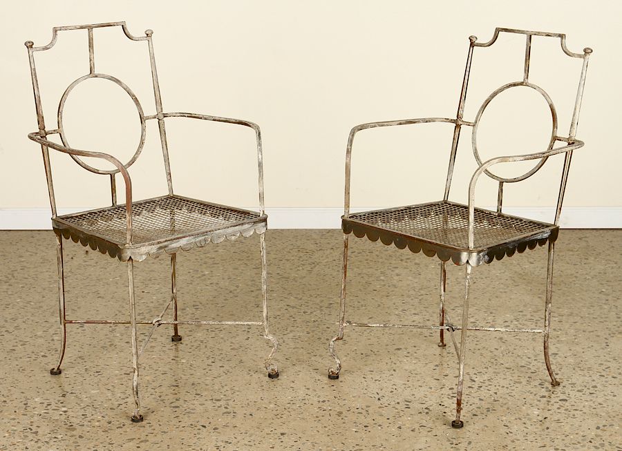 Appraisal: PAIR WROUGHT IRON CHAIRS BY GILBERT POILLERAT A pair of