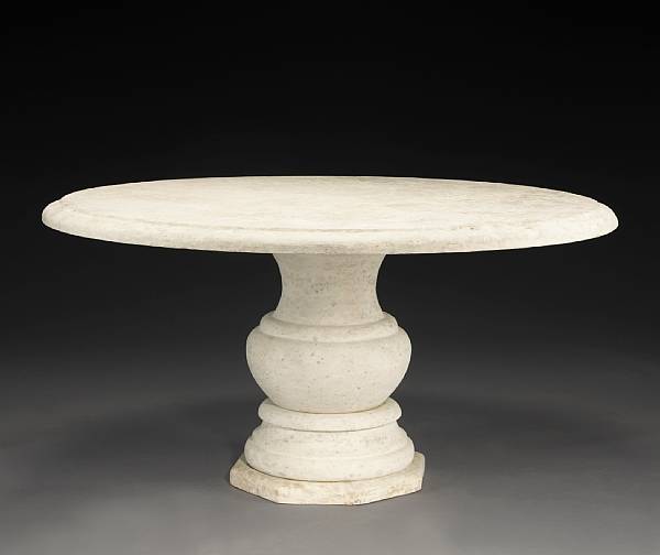 Appraisal: A Baroque style limestone garden table modern The molded edge