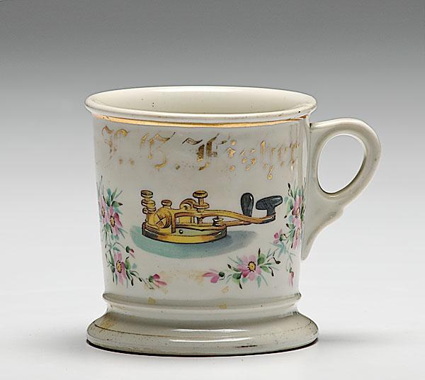 Appraisal: TELEGRAPH OPERATOR'S OCCUPATIONAL SHAVING MUG porcelain with polychrome painted scene