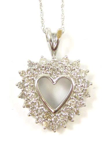 Appraisal: DIAMOND AND FOURTEEN KARAT WHITE GOLD PENDANT NECKLACE suspended on