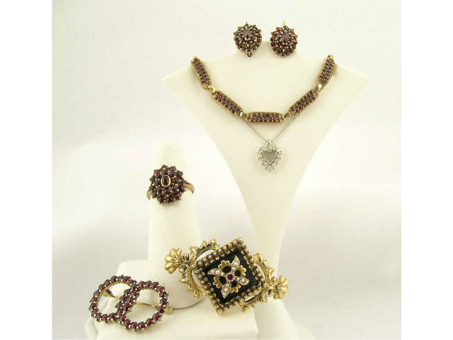 Appraisal: Lot of vintage costume jewelry including matching set of garnet