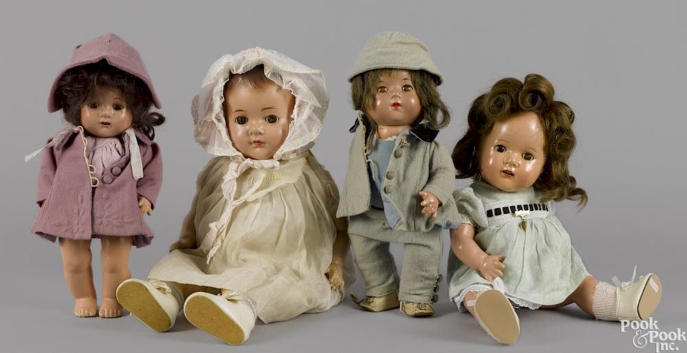 Appraisal: Four Madame Alexander composition Dionne Quintuplets dolls with sleep eyes