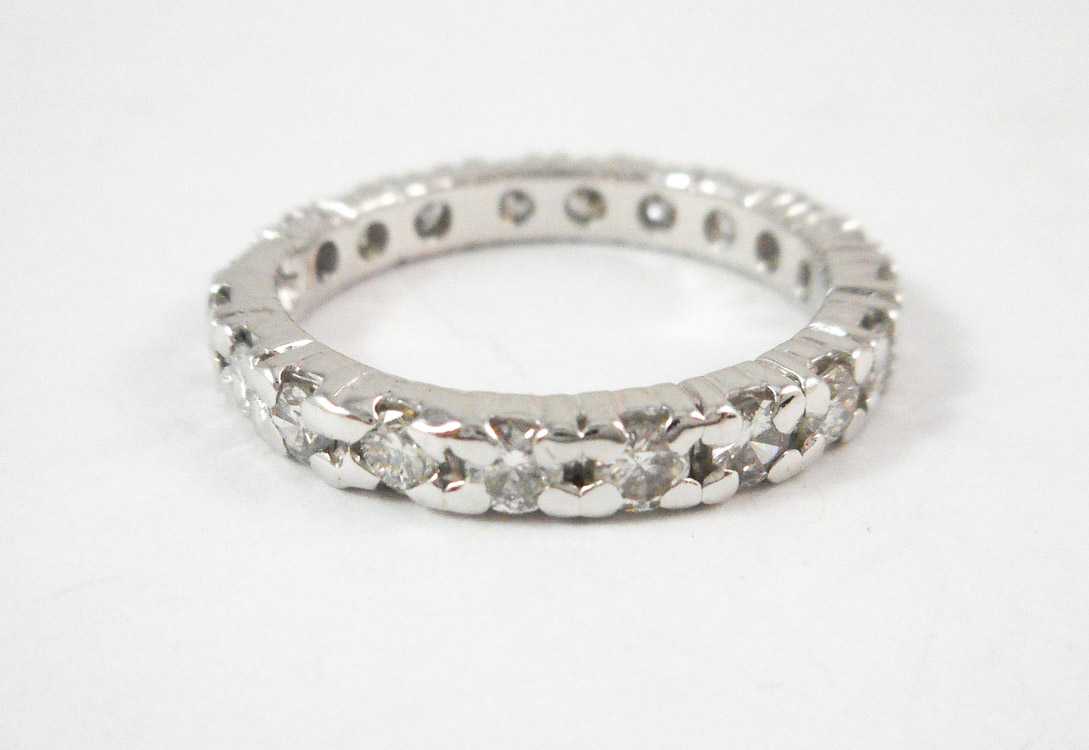 Appraisal: DIAMOND AND FOURTEEN KARAT GOLD ETERNITY RING The k white