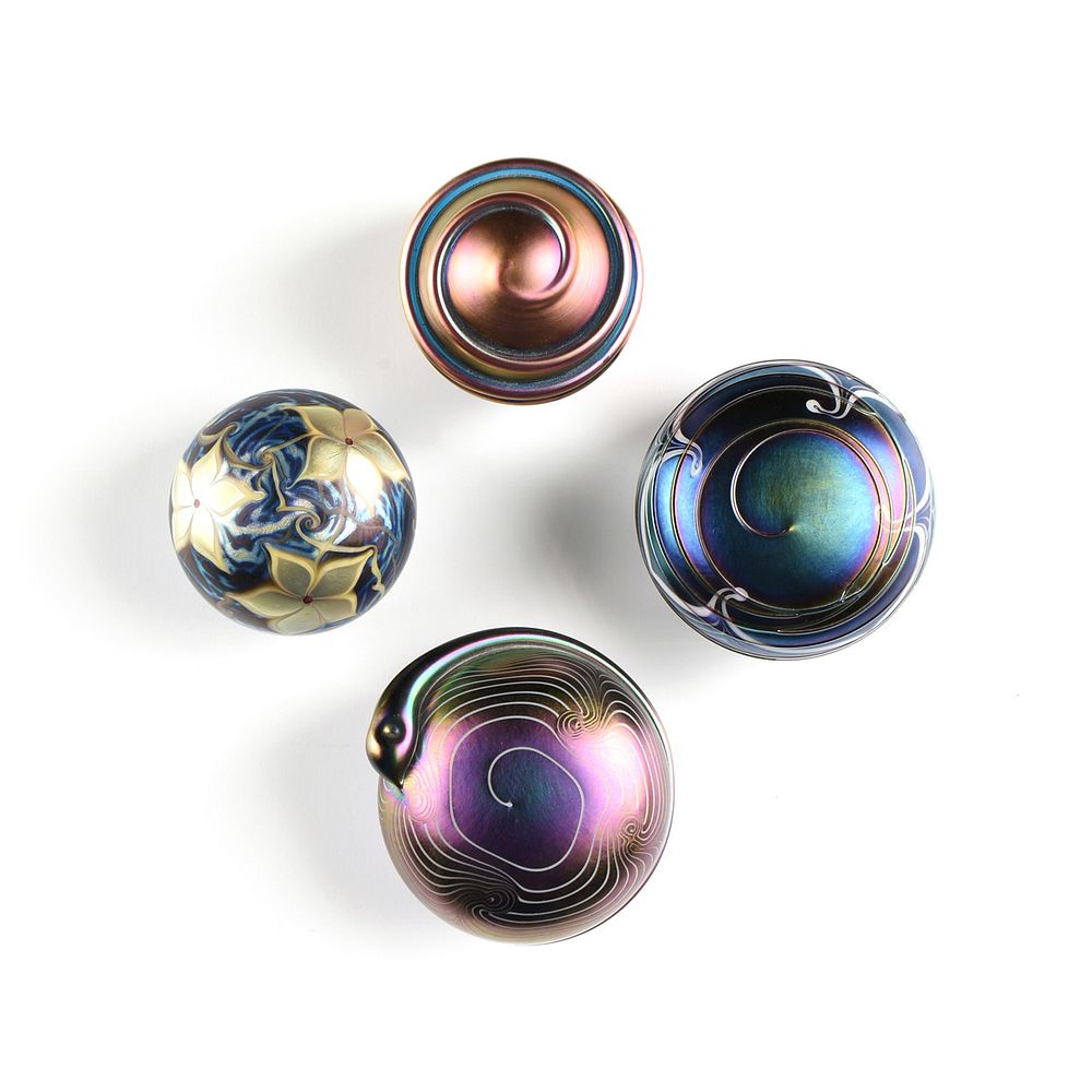 Appraisal: A GROUP OF FOUR IRIDESCENT SATIN GLASS PAPERWEIGHTS SIGNED LATE