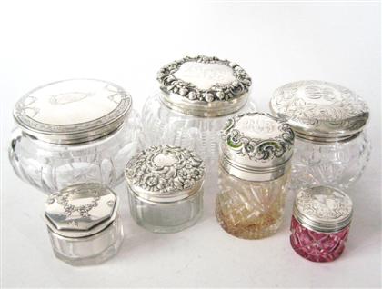 Appraisal: Three cut glass powder jars with sterling silver lidscirca