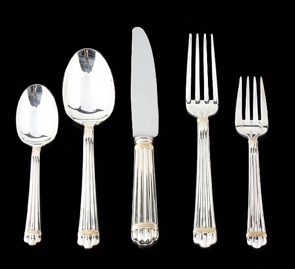 Appraisal: A French silverplate flatware set with caseChristofle ParisAria Gold Comprising