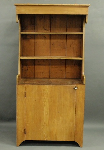 Appraisal: One-piece cupboard early th c with grain paint decoration and