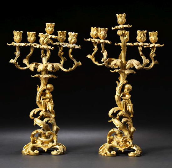 Appraisal: Near-Pair of Napoleon III Gilt-Bronze Six-Light Figural Candelabra third quarter