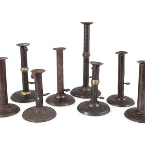 Appraisal: Eight Sheet Tin Hogscraper Candlesticks th Century and earlier of