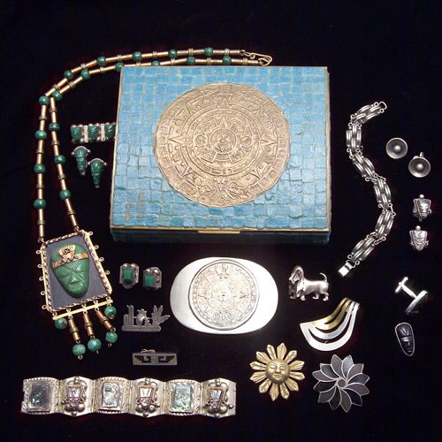 Appraisal: A collection of largely Mexican silver jewelry in a glass