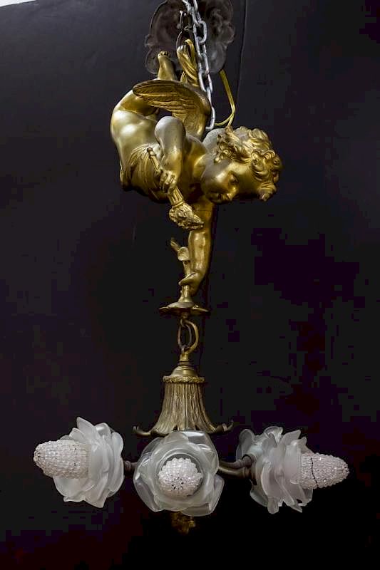 Appraisal: Empire-Manner Chandelier Antique Bronze w Cherub Antique chandelier with large