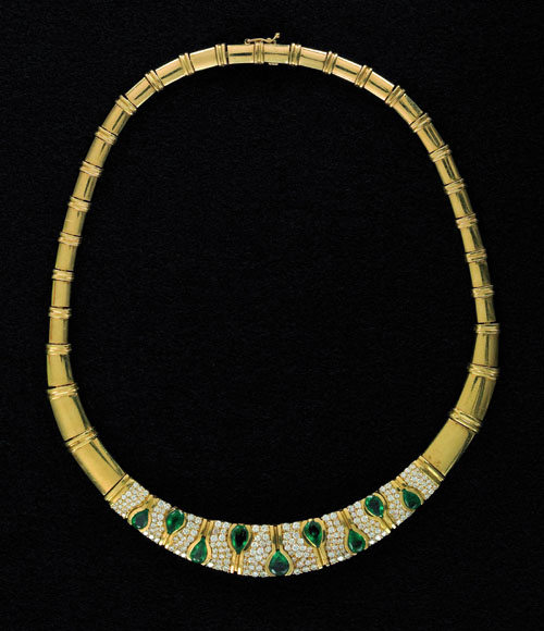 Appraisal: K yellow gold emerald and diamond tapered necklace with nine